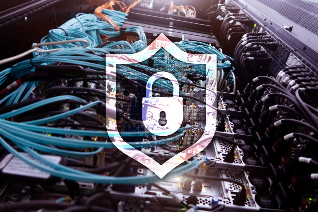 A lock-and-shield icon hovers over a mass of wires in a data center rack, demonstrating one of the cost elements of CMMC.